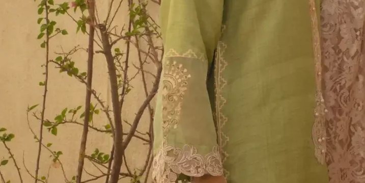 Green raw silk shirt with embroidered detailing paired with match capri pants & chantilly lace dupatta – SHK-1078
