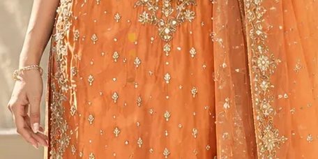 Orange dabka ensemble